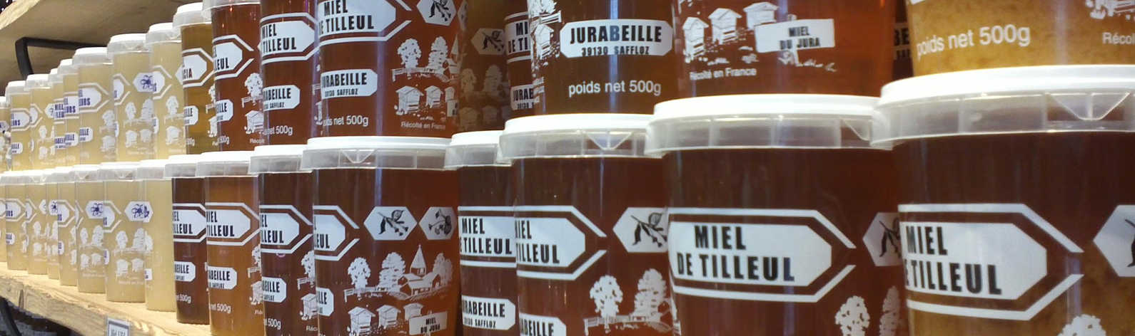 présentation des pots de miels jurabeille